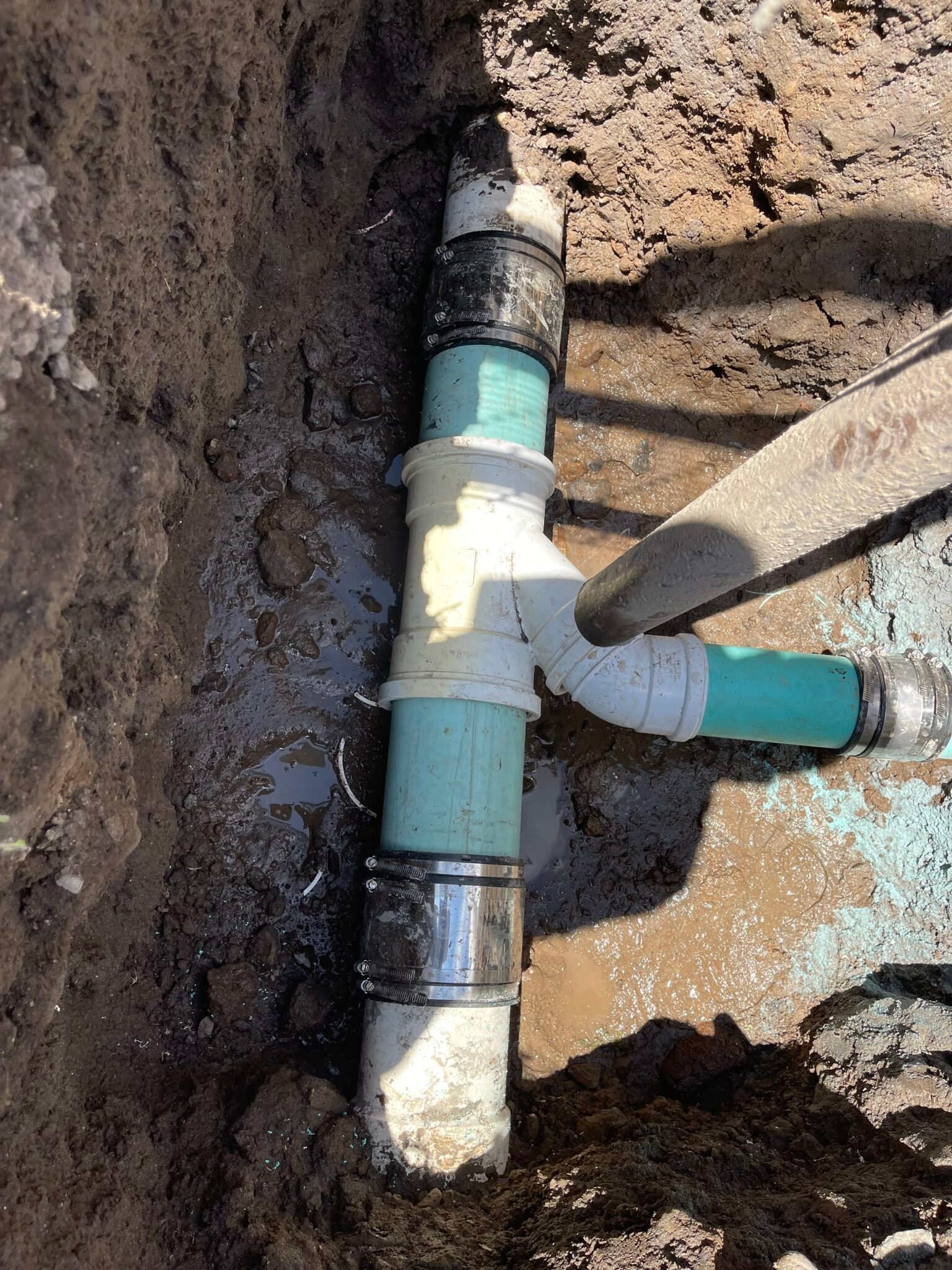Drain Bros llc helps fix septic system pipes underground during an urgent repair to keep homes safe and working properly.