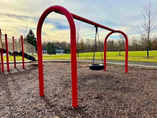 Spacious playground shows where Drain Bros llc can help with household excavation or septic system solutions nearby.
