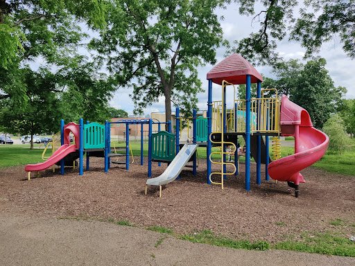 The playground shows a safe, finished yard area after Drain Bros llc improved the land for families to enjoy.