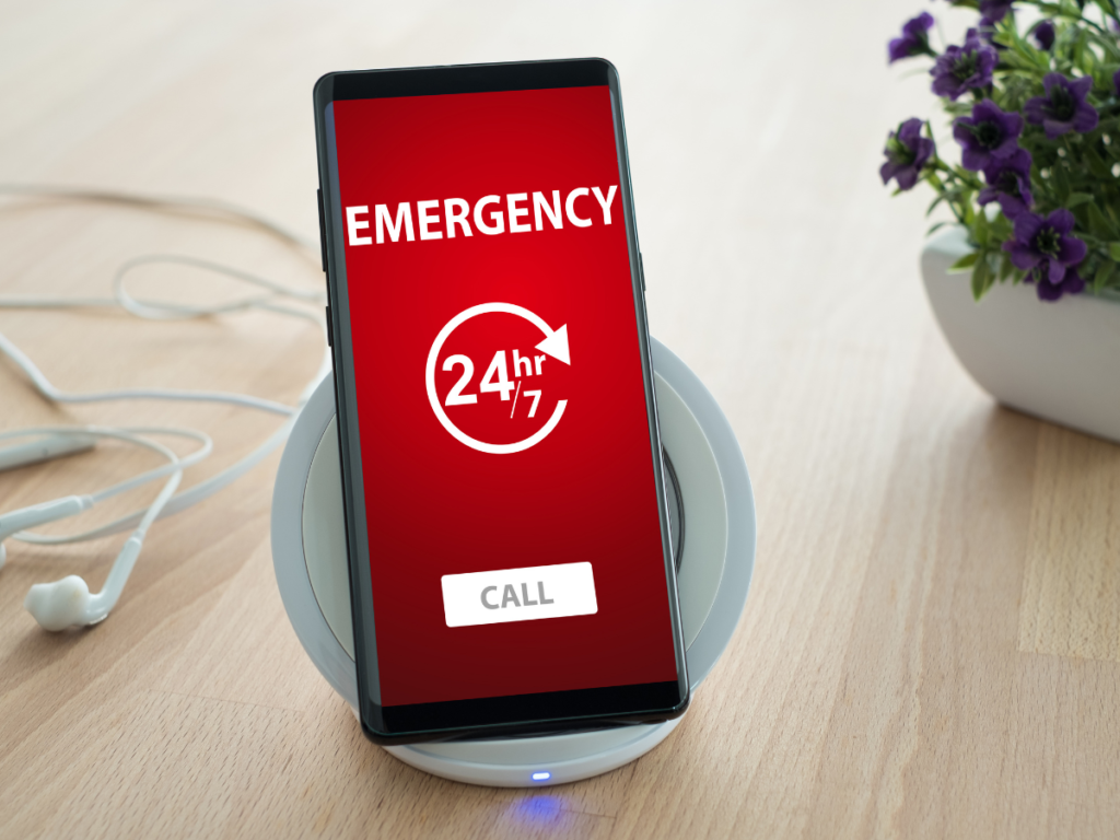 A phone shows Drain Bros llc’s 24/7 emergency help, reminding you not to ignore sewer line problems.